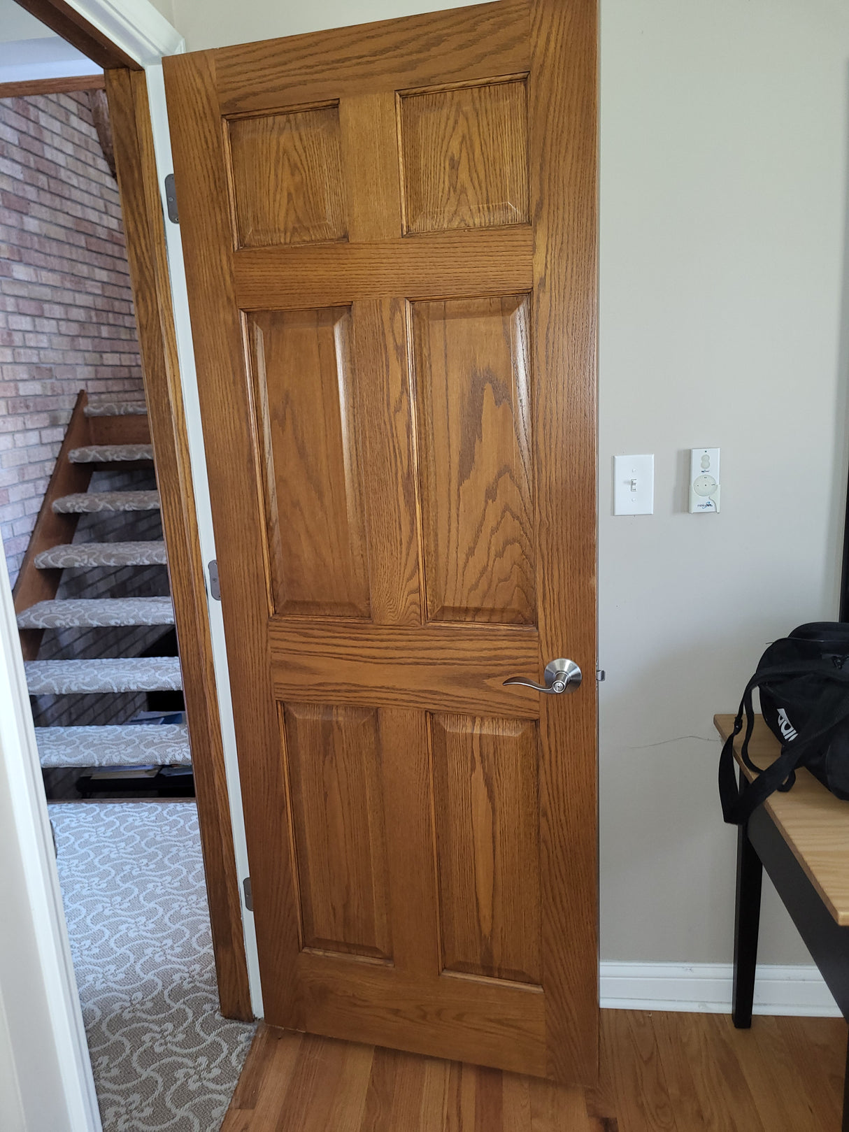 (11) Oak stained 6 panel doors & hardware