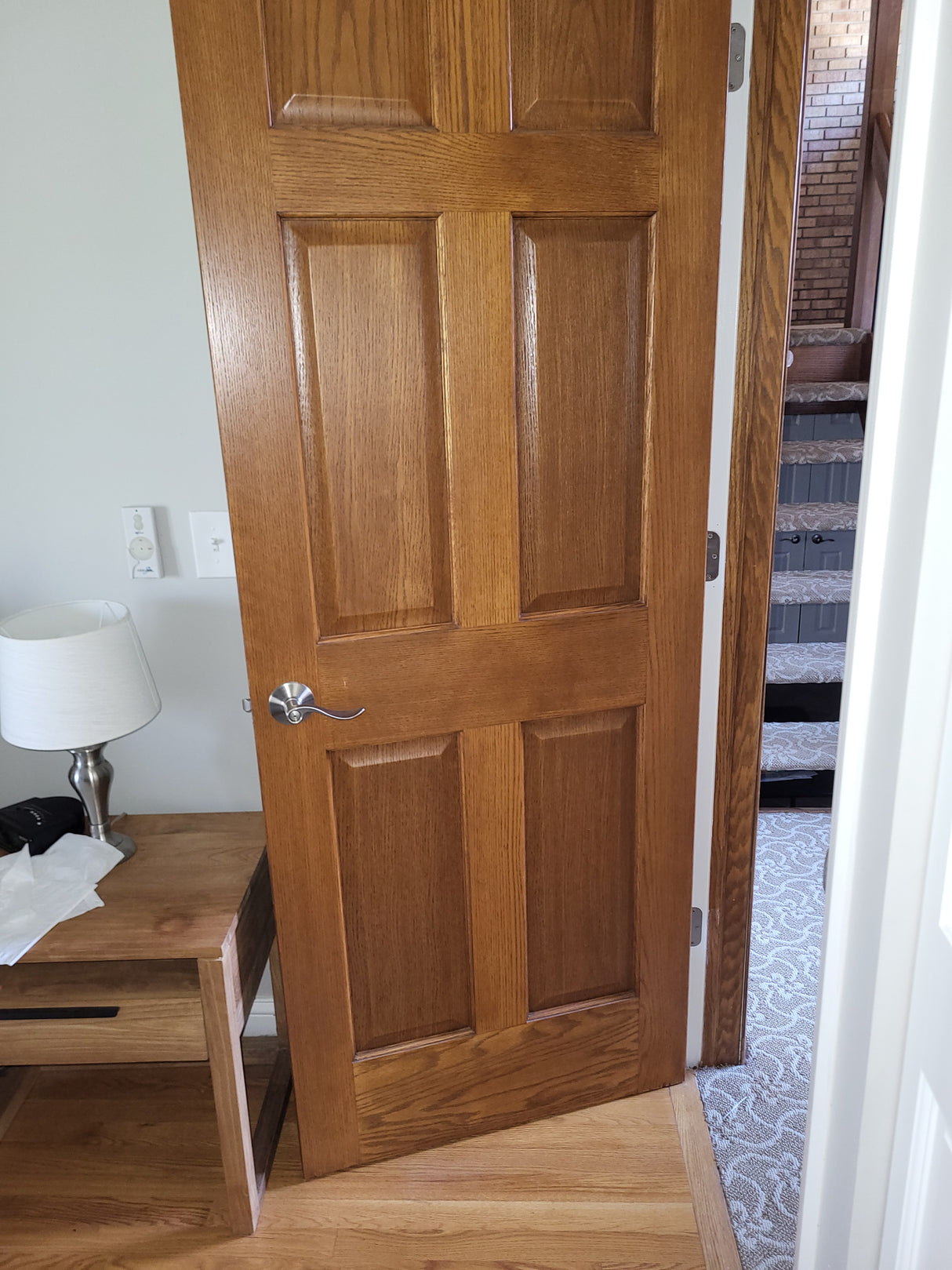 (11) Oak stained 6 panel doors & hardware