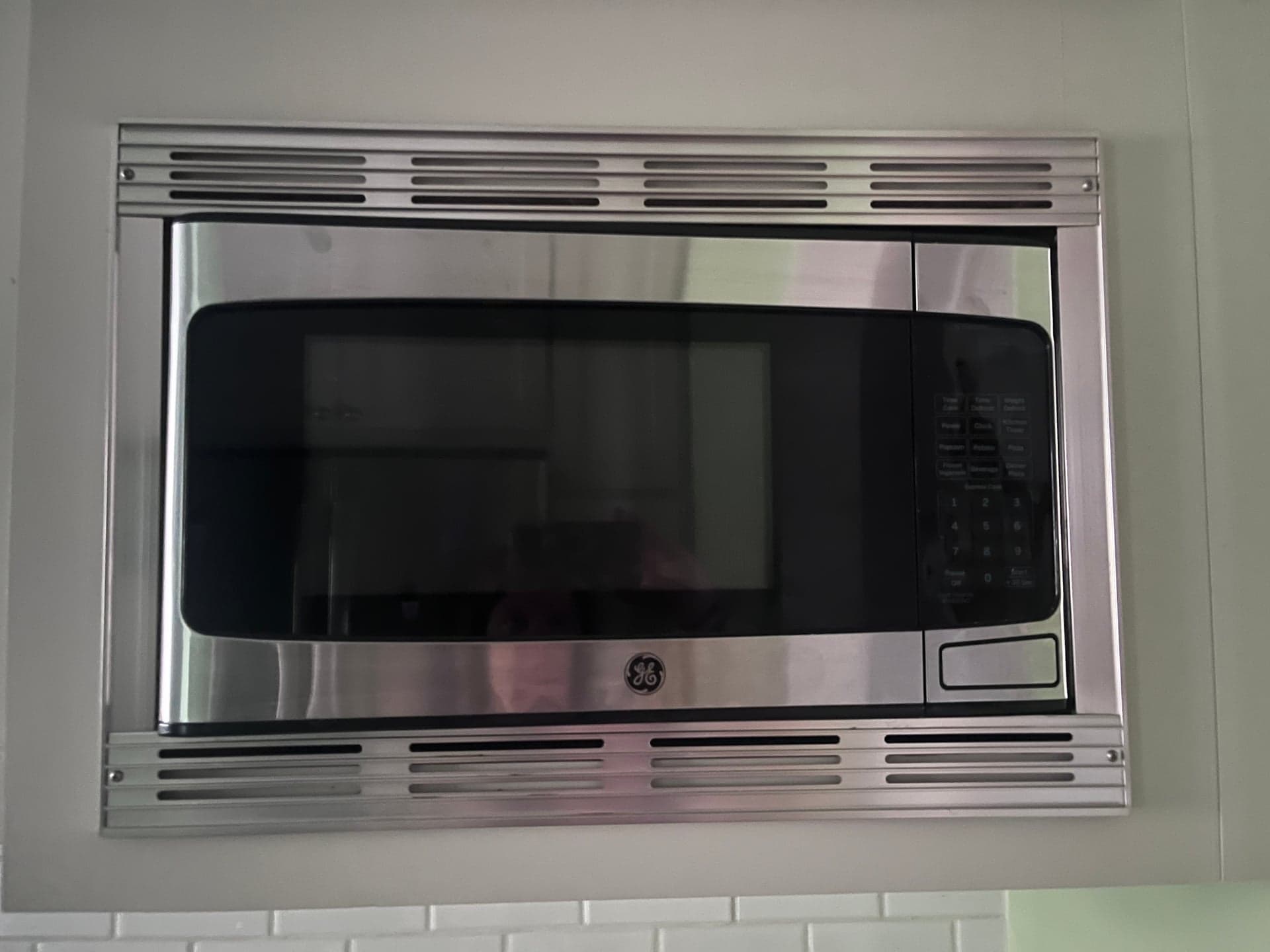 GE Stainless Steel Built-In Microwave with Trim Kit, Buyer Removes