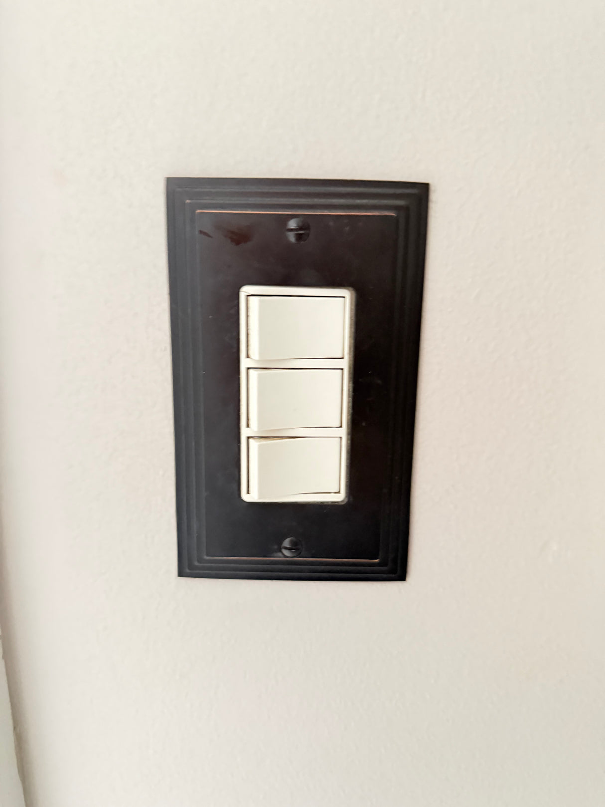Triple Rocker Light Switch + Amerelle Bronze Cast Metal Wall Plate