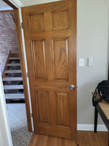 (11) Oak stained 6 panel doors & hardware