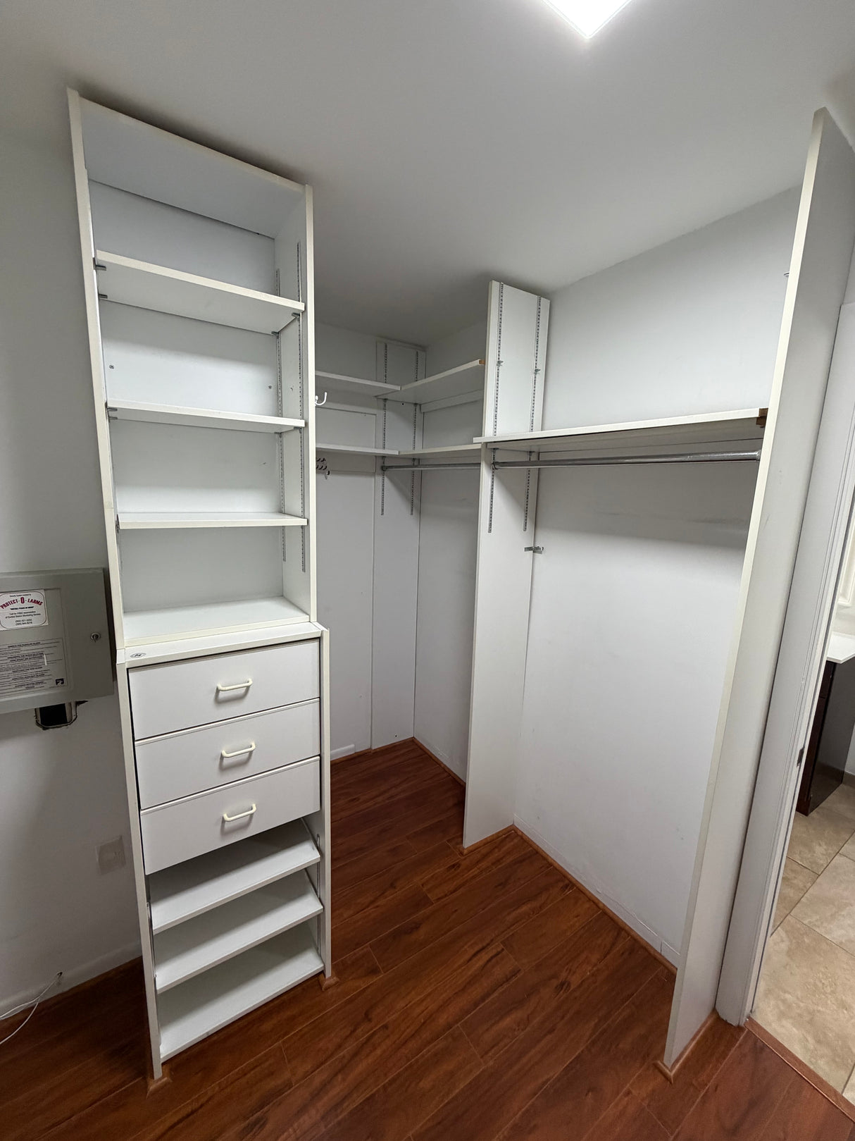 Custom Walk-In Closet System with Shelving & Drawers