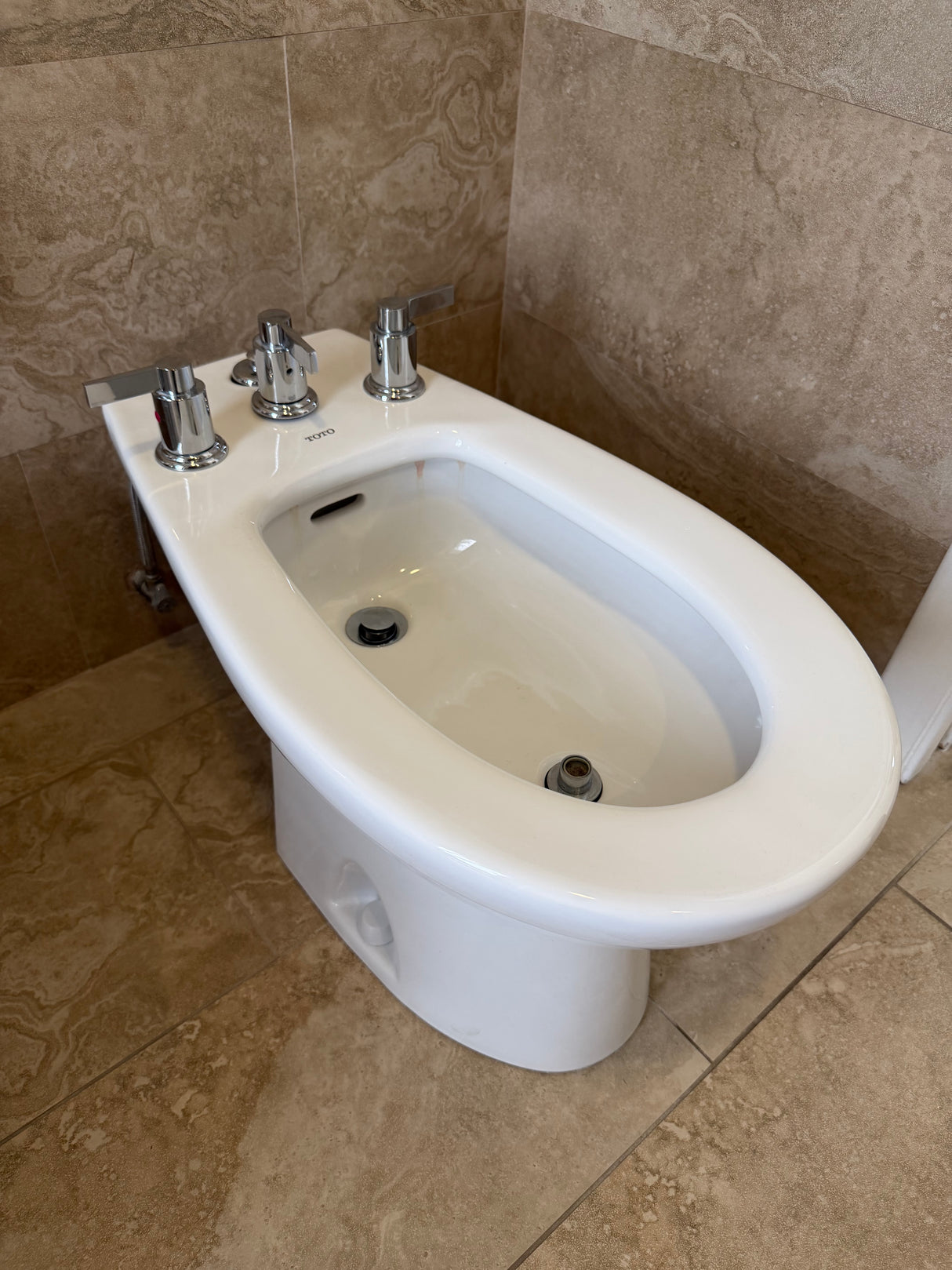 Modern TOTO Bidet with Chrome Fixtures