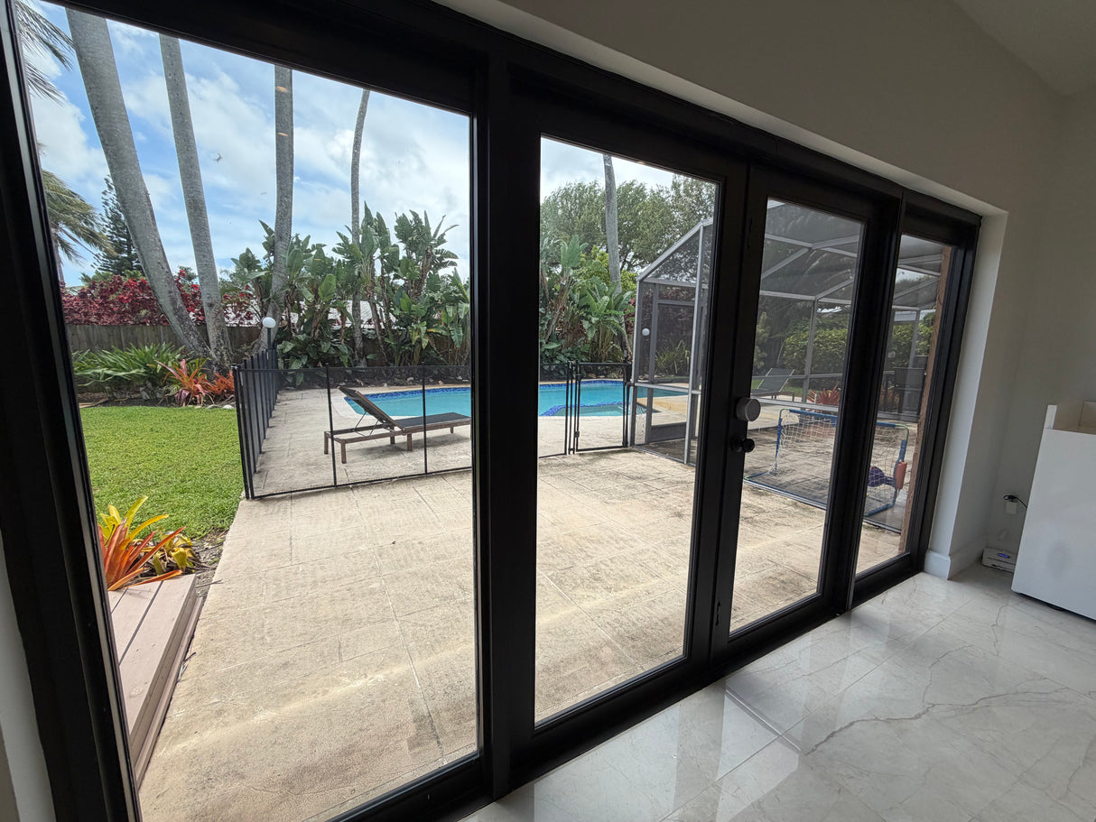 Luxury Hurricane Impact Glass Door System – Modern Black Aluminum